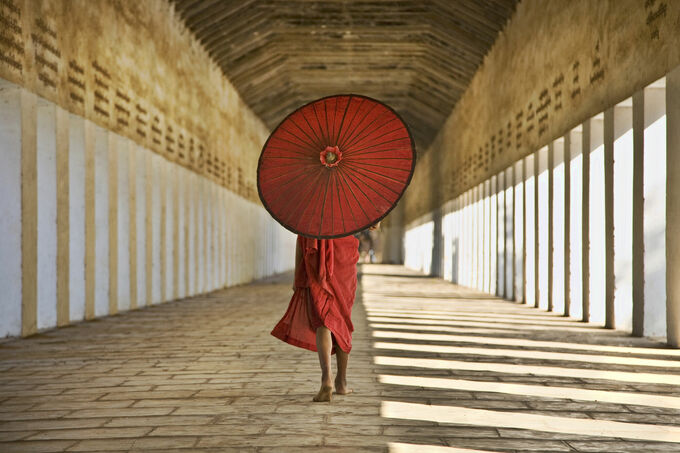 Monk walking in his monastery