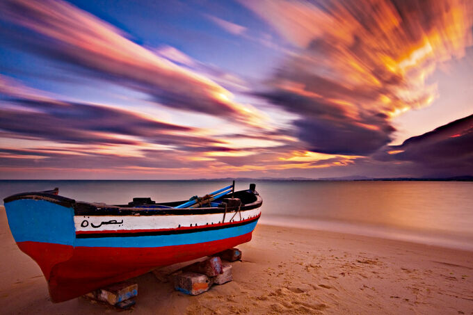 Fishing boat at sunset